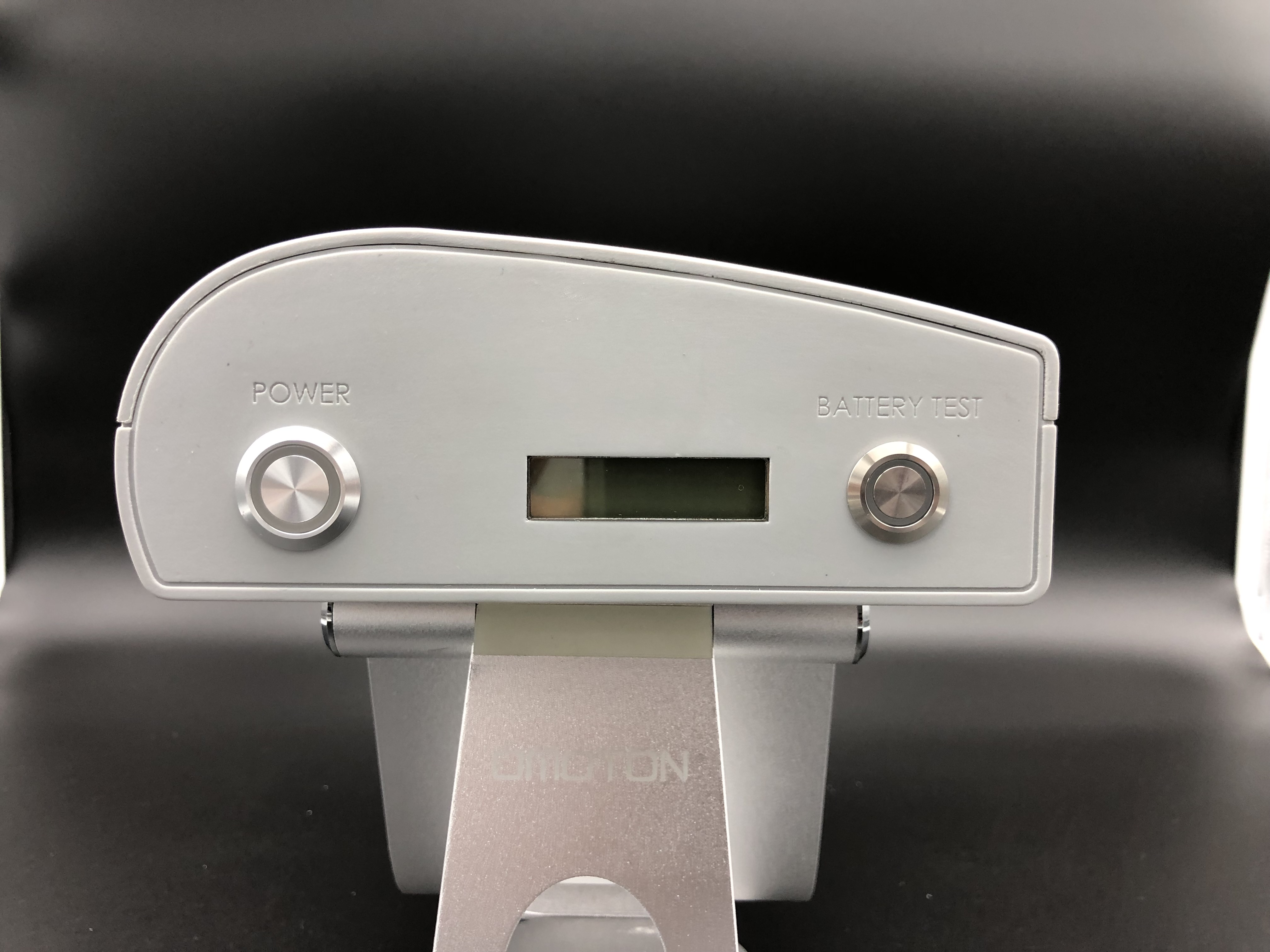 Close-up view of Icarus ONE IFE device control buttons and interface